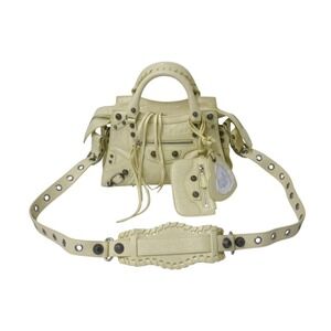 BALENCIAGA Neo Cagole XS shoulder bag yellow lambskin